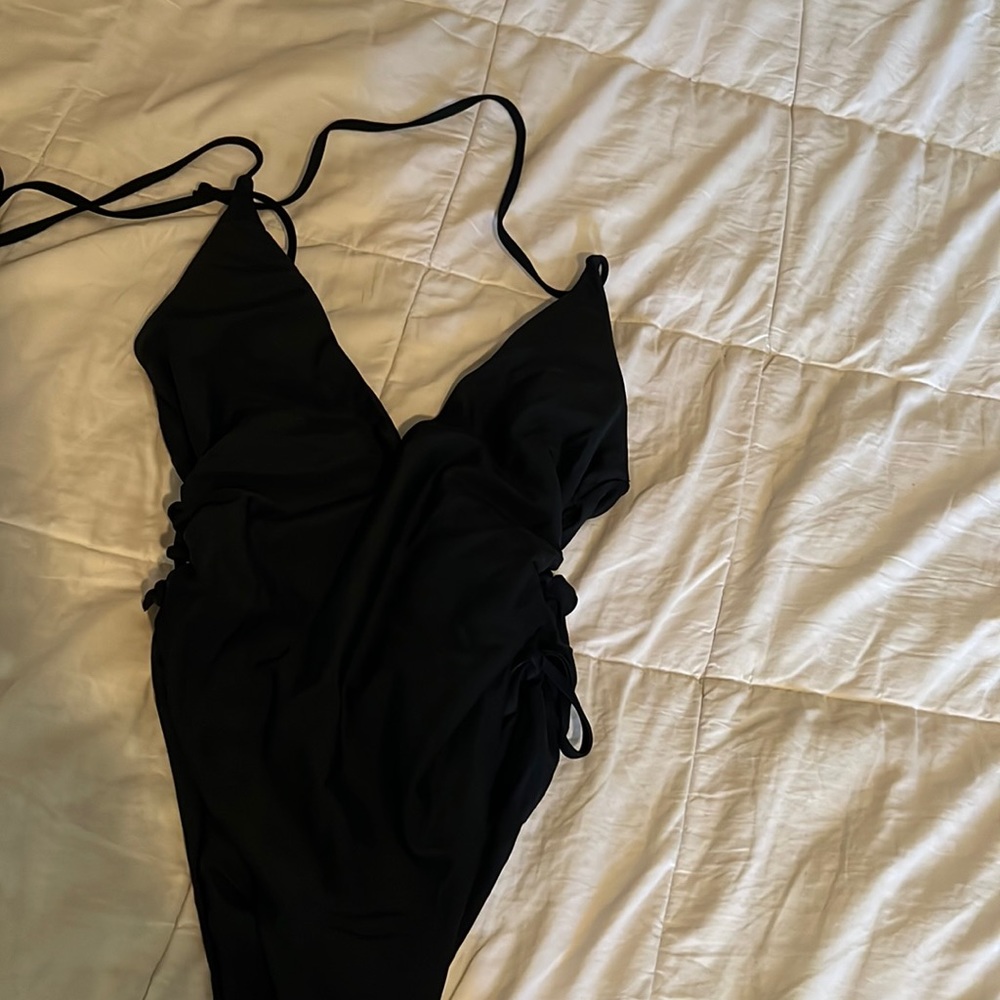 one piece bathing suit ties down each side